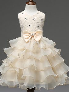 Champagne Sleeveless Lace and Ruffled Layers and Bowknot Knee Length Pageant Dress