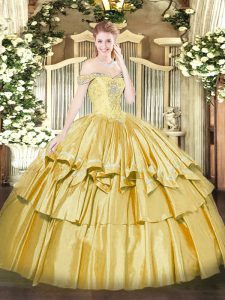 Sleeveless Organza and Taffeta Floor Length Lace Up Quinceanera Gown in Gold with Beading and Ruffled Layers